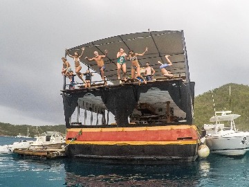 Carefree clients jumping off the new Willy T, Norman Island, BVI